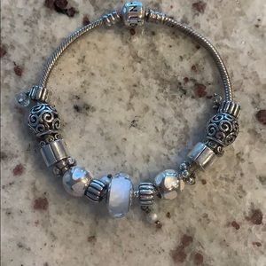 Like new pandora bracelet with clips and beads